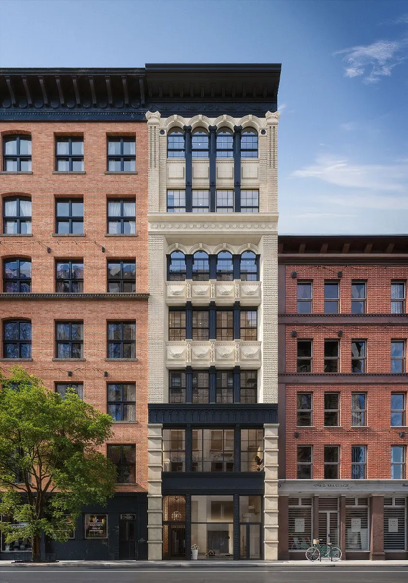 3D exterior rendering of The Willow, a slender seven-story limestone and stone residential building at 84 University Place in Manhattan, set between two brick neighbors with ground-floor retail glazing.