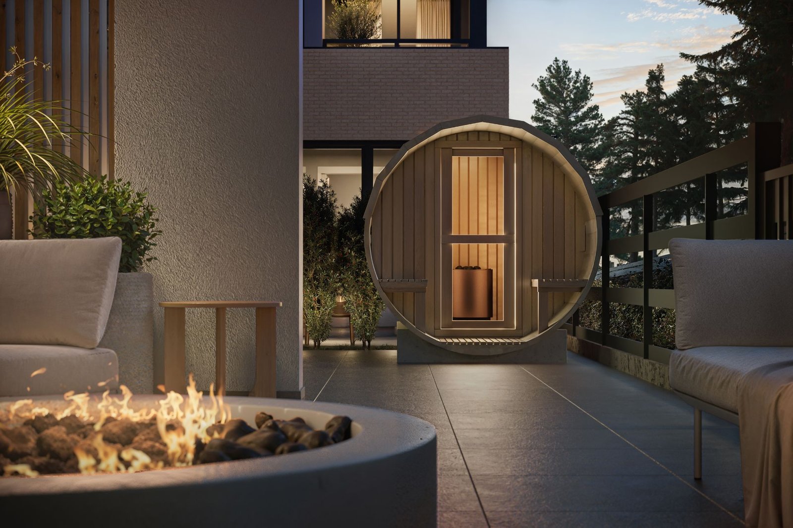 3D rendering of the Muse outdoor wellness terrace at dusk, with a fire table, woven lounge chairs, a cedar barrel sauna, and a backdrop of evergreens.